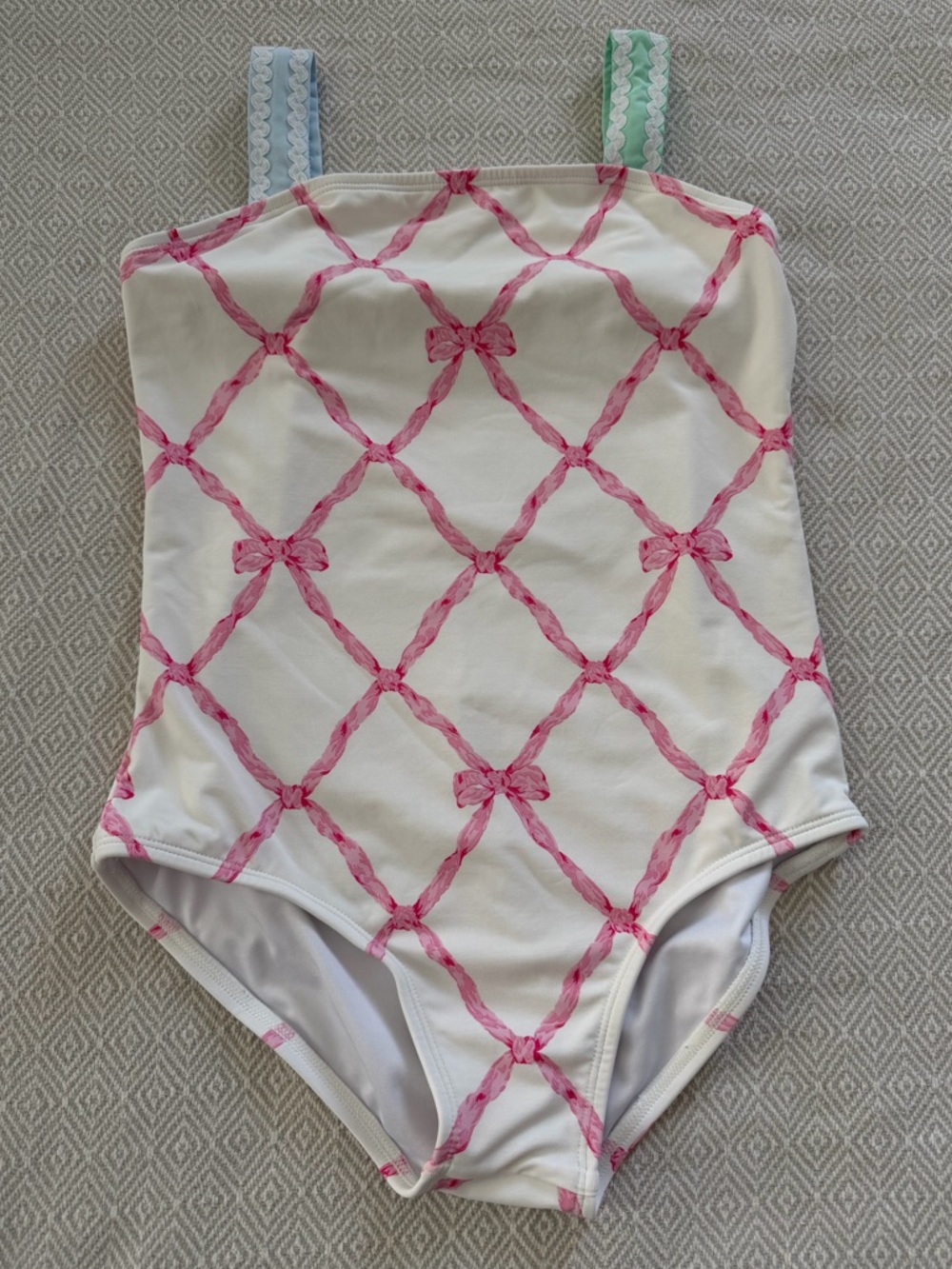 The Beaufort Bonnet Company Girls White One-Piece Swimsuit with Pink Bow Lattice